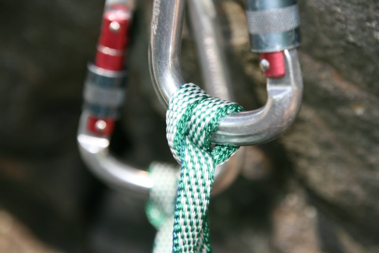Building a belay with a Clove hitch. Photo: Andreas Bengtsson